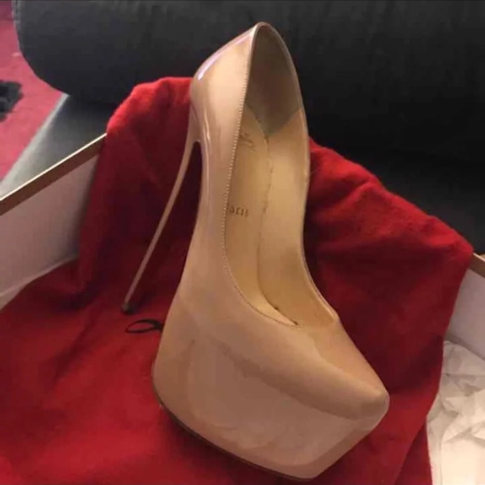 Christian Loubutin nude Daffodile platform heels.
